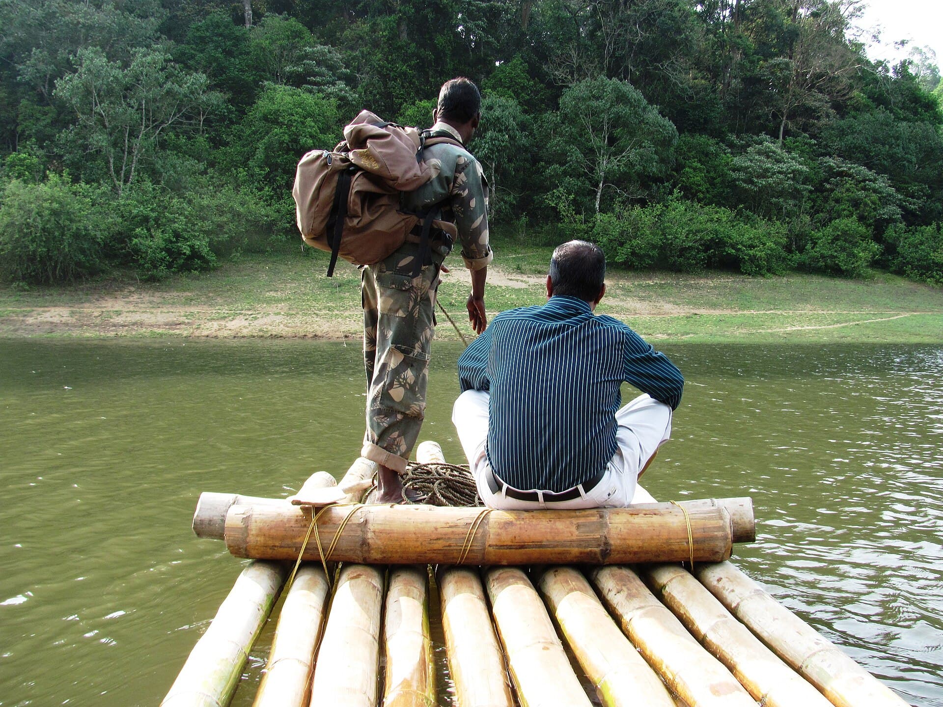 Visitors on a bamboo raft on Periyar Lake